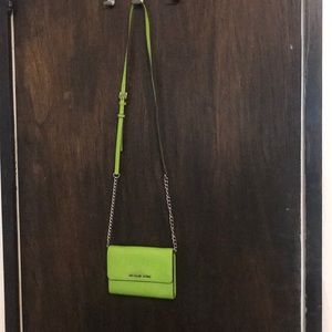 Michael Kors accordion green clutch/crossbody